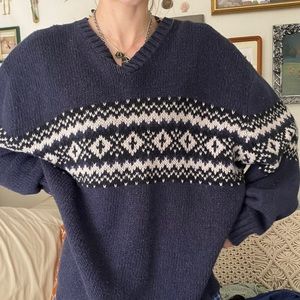 navy blue and white knit patterned sweater